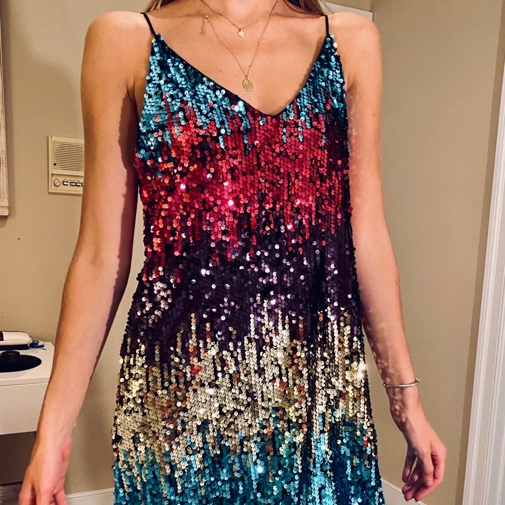 Fun, disco-esque mini dress with tons of sparkle